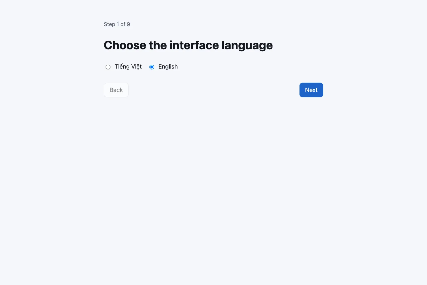 First screen of the setup wizard with two options, Tiếng Việt and English, for the interface language