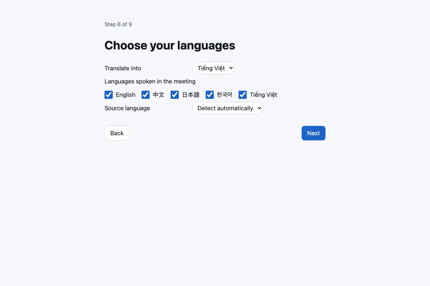 Choose your languages step with the Translate into menu, five spoken-language checkboxes and the Source language menu